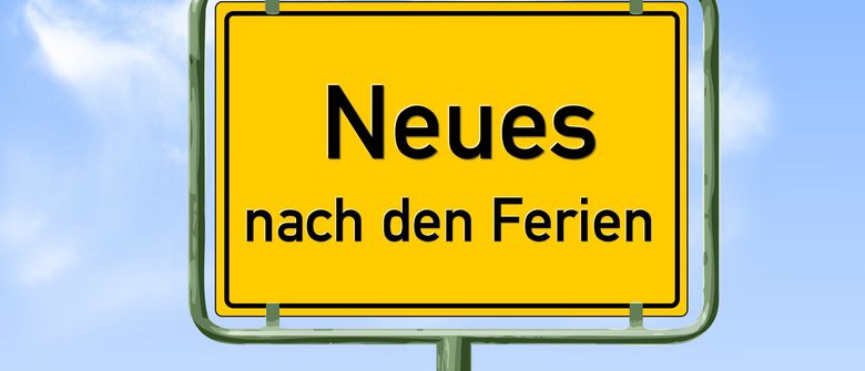 Schild mit Aufschrift: Neues nach den Ferien Schild mit Aufschrift: Neues nach den Ferien